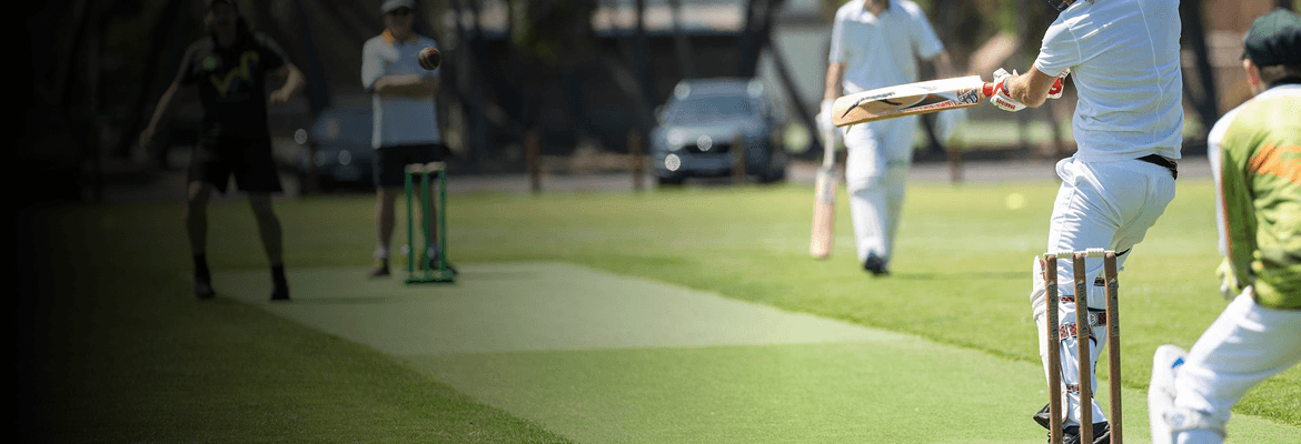 Indoor practice lane with synthetic turf pitch